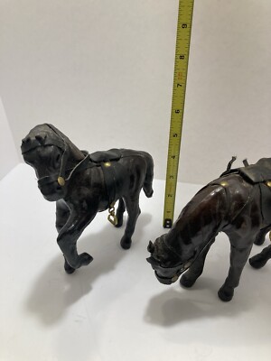 2 Leather bound horses with saddles-image