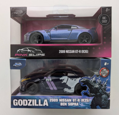 Jada Toys 1:32 2009 Nissan GT-R R35 Pink Slips Purple + Godzilla Hollywood Rides-image