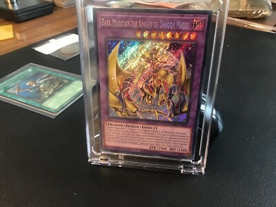 * DARK MAGICIAN THE DRAGON KNIGHT OF MAGIC * 1ST SECRET RARE BLMR-EN001 YUGIOH!-image