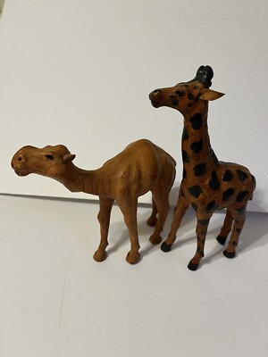 Two Leather Bound Animals Camel And Giraffe-image